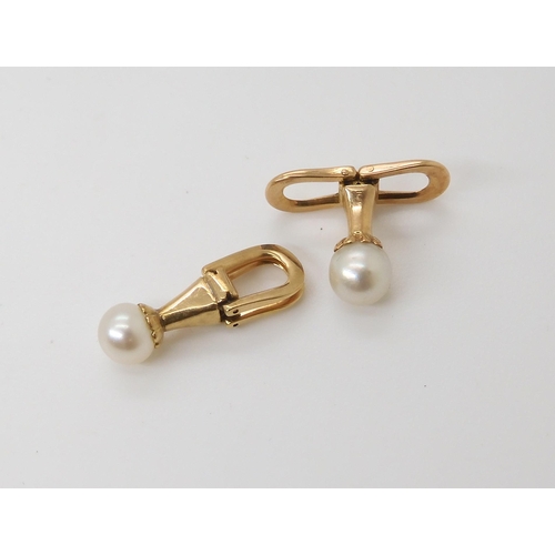 760 - A PAIR OF GARRARD'S PEARL CUFFLINKSmounted in yellow metal the pearls measure approx 5.6mm. In origi... 