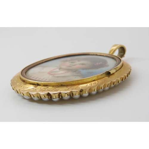 762 - A DOUBLE SIDED PORTRAIT MINIATURE LOCKETstamped 15ct to the bail, the portrait of a lady surrounded ... 