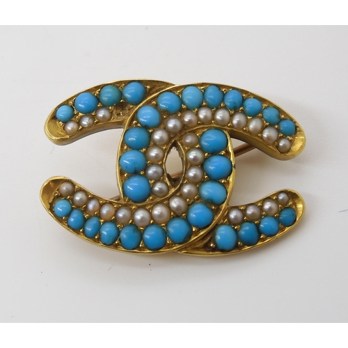 771 - A VICTORIAN DOUBLE HORSESHOE BROOCHset with split pearls and turquoise. dimensions 3cm x 2cm, weight... 