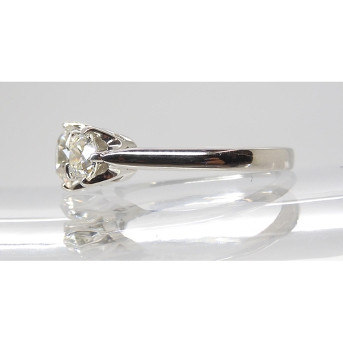 776 - A PLATINUM THREE STONE DIAMOND RINGset with estimated approx 1.90cts of old cut diamonds combined. F... 