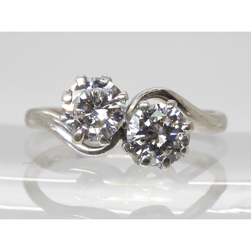 777 - AN 18CT & PLATINUM TWIN STONE DIAMOND RINGset with estimated approx 1.45cts of brilliant cut dia... 