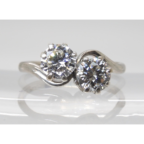 777 - AN 18CT & PLATINUM TWIN STONE DIAMOND RINGset with estimated approx 1.45cts of brilliant cut dia... 