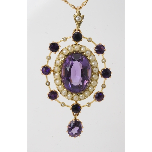 779 - A 15CT GOLD EDWARDIAN PENDANTset with amethyst and pearls, the central amethyst is approx 13.5mm x 1... 