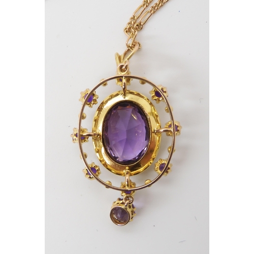 779 - A 15CT GOLD EDWARDIAN PENDANTset with amethyst and pearls, the central amethyst is approx 13.5mm x 1... 