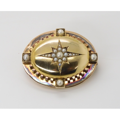 785 - A YELLOW METAL PEARL SET STAR BROOCH with a locket back. Dimensions 4.3cm x 3.3cm, weight 19.2g... 