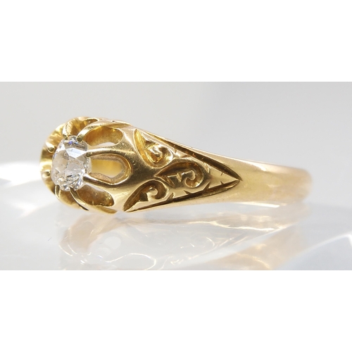 787 - AN 18CT GOLD EDWARDIAN SOLITAIRE DIAMOND RINGset with an estimated approx 0.20cts, with scrolled mou... 