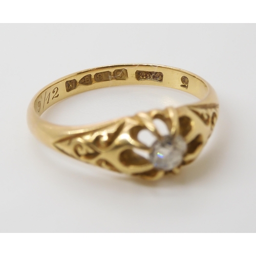 787 - AN 18CT GOLD EDWARDIAN SOLITAIRE DIAMOND RINGset with an estimated approx 0.20cts, with scrolled mou... 