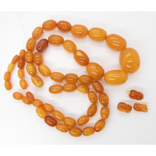 788 - A STRING OF AMBER COLOURED BEADSlargest bead 22.7mm, smallest 9.1mm, weight 33.4gms... 