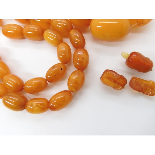 788 - A STRING OF AMBER COLOURED BEADSlargest bead 22.7mm, smallest 9.1mm, weight 33.4gms... 