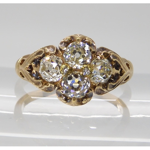 800 - AN ART NOUVEAU DIAMOND RINGthe yellow metal mount with chased foliate design is set with estimated a... 