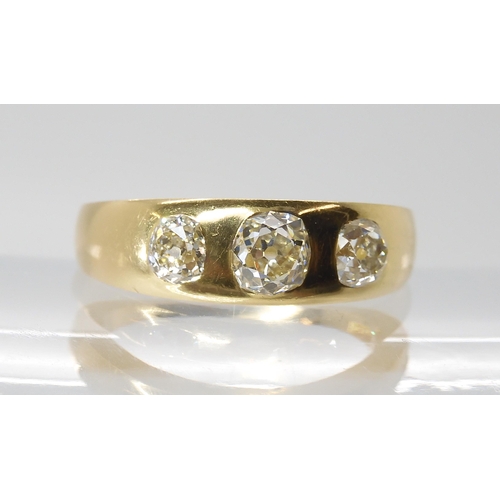 806 - AN EARLY HAMILTON & INCHES THREE STONE RINGgypsy set with estimated approx 0.75cts of old cut di... 