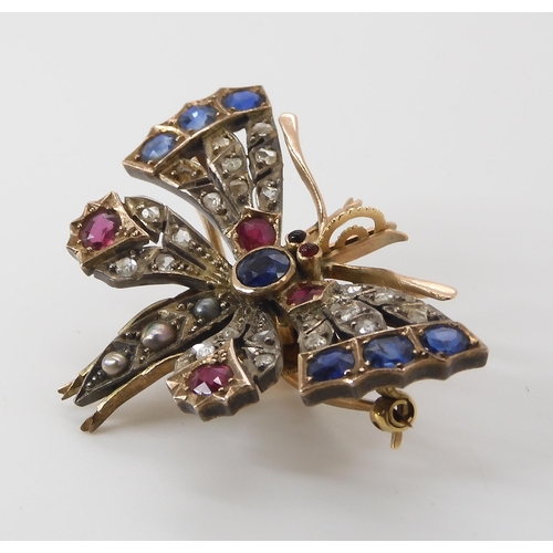 813 - A GEM SET BUTTERFLY BROOCHset with sapphires, rubies, pearls and rose cut diamonds. Dimensions 4.4cm... 