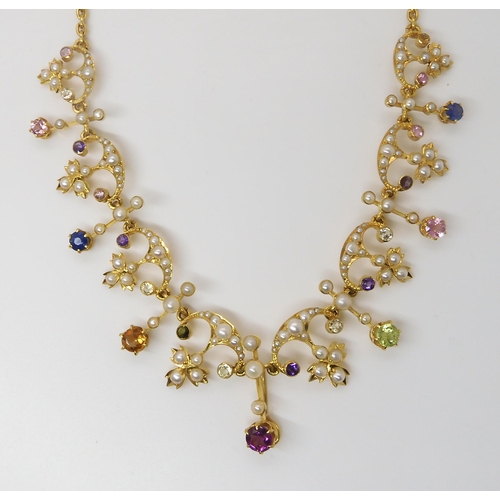 826 - A 15CT GOLD MULTI GEM AND PEARL SET NECKLACEset with amethysts, citrines, sapphires, tourmalines etc... 