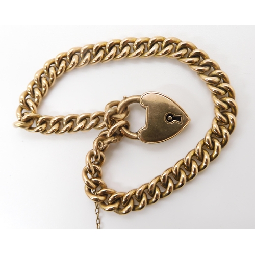 829 - A 9CT GOLD CURB LINK BRACELETwith a traditional heart shaped clasp, both chain and clasp stamped 9c,... 