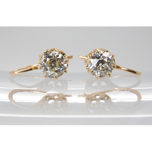 835 - A PAIR OF DIAMOND EARRINGSthe old cut diamonds weigh in at estimated approximately 1.50cts combined,... 