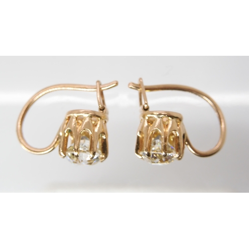 835 - A PAIR OF DIAMOND EARRINGSthe old cut diamonds weigh in at estimated approximately 1.50cts combined,... 