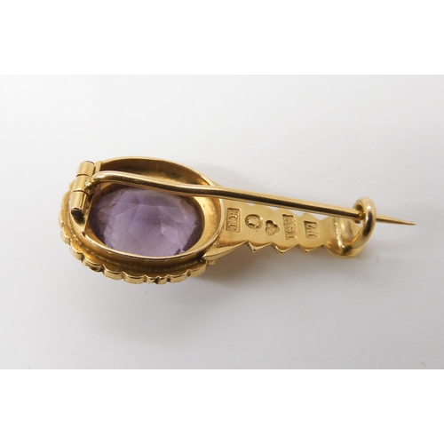 838 - A SWEDISH AMETHYST AND PEARL COMET BROOCHdated 1917 (P7) makers mark J.P. Length 2.7cm x 1.3cm, weig... 