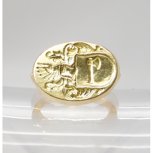 840 - AN 18CT GOLD SIGNET RINGintaglio cut with a family crest. hallmarked London 1987, Maker's mark WB, f... 