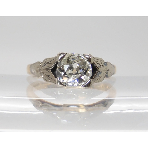 844 - AN 18CT OLD CUT DIAMOND RINGwith white gold leaf design shoulders the approximate dimensions of the ... 