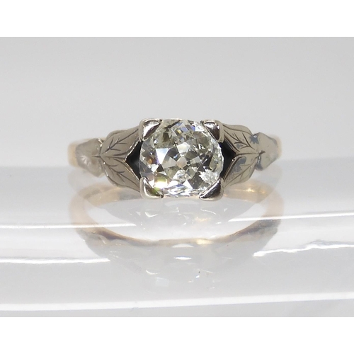 844 - AN 18CT OLD CUT DIAMOND RINGwith white gold leaf design shoulders the approximate dimensions of the ... 