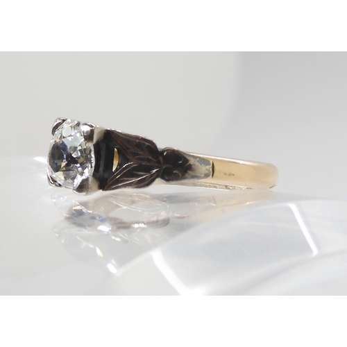 844 - AN 18CT OLD CUT DIAMOND RINGwith white gold leaf design shoulders the approximate dimensions of the ... 