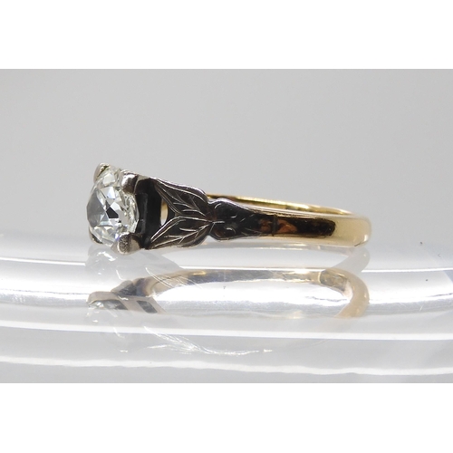 844 - AN 18CT OLD CUT DIAMOND RINGwith white gold leaf design shoulders the approximate dimensions of the ... 