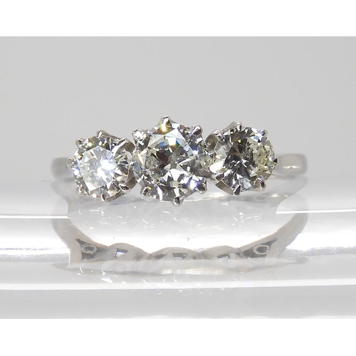 846 - A THREE STONE DIAMOND RINGset throughout in platinum. the three brilliant cut diamond are estimated ... 