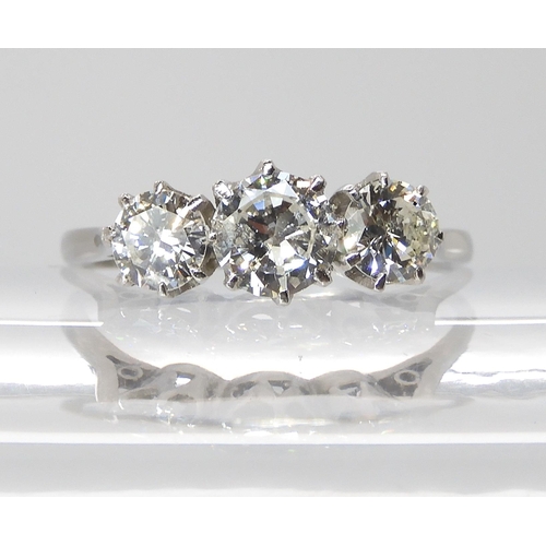 846 - A THREE STONE DIAMOND RINGset throughout in platinum. the three brilliant cut diamond are estimated ... 