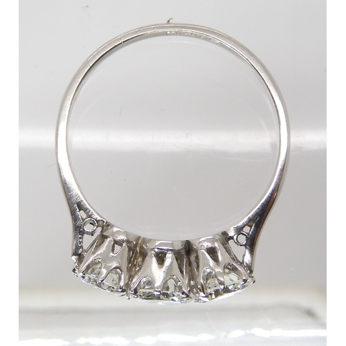 846 - A THREE STONE DIAMOND RINGset throughout in platinum. the three brilliant cut diamond are estimated ... 