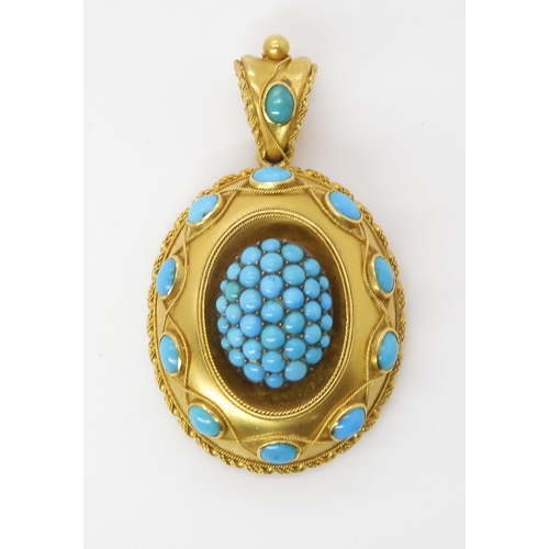 847 - A VICTORIAN TURQUOISE LOCKET BACK PENDANTmade in bright yellow metal with wire work detail. Length 5... 