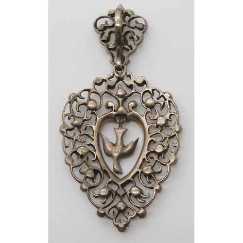 850 - A FRENCH DOVE INSIDE A HEART PENDANTmarked with the silver wild boar stamp to the bail. and set with... 