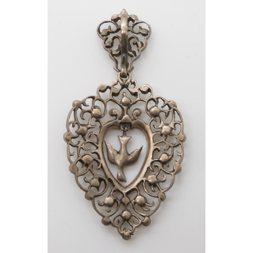 850 - A FRENCH DOVE INSIDE A HEART PENDANTmarked with the silver wild boar stamp to the bail. and set with... 