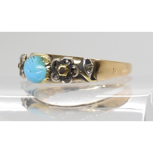 855 - A MOURNING RINGin yellow metal, set with diamond and ruby forget-me-not flowers and a turquoise carv... 