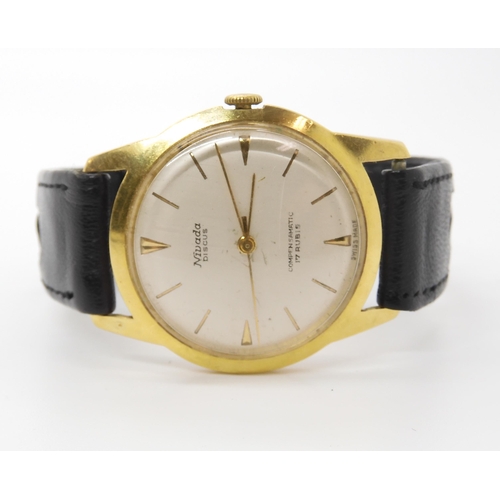 AN 18CT GOLD NIVADA DISCUS COMPENSAMATIC with cream dial gold