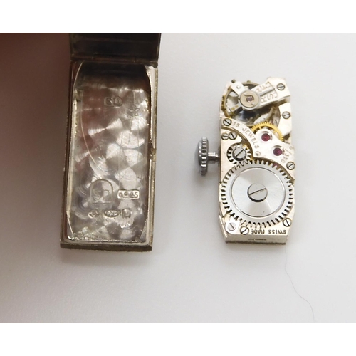 920 - A FORTNUM & MASON COCKTAIL WATCHwith diamante silver case. The swiss 15 jewel movement winds and... 