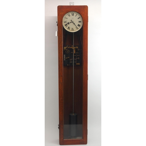 601 - A SYNCHRONOME ELECTRIC MASTER WALL CLOCKsilver coloured dial in oak glazed case, with pendulum, 127c... 