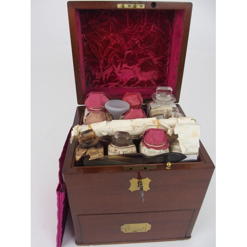 616 - A VICTORIAN MAHOGANY AND BRASS BOUND APOTHECARY BOXthe fitted interior with bottles and glass p... 