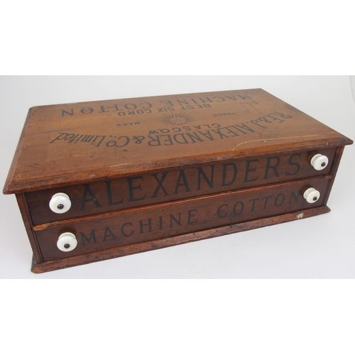 617 - A R.F. & J. ALEXANDER & CO., LTD STAINED PINE COUNTER REEL CHESTthe front with two drawers i... 