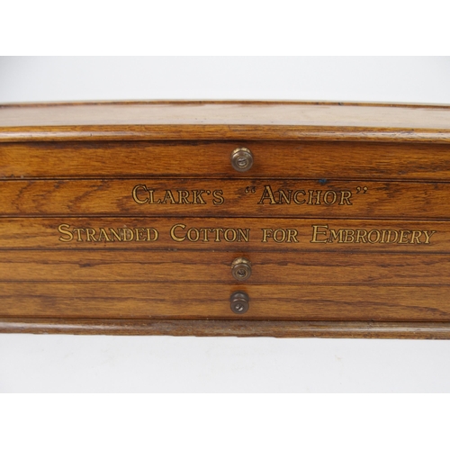 618 - AN OAK CANTILEVER FOUR TIER THREAD BOXwith gilt painted lettering inscribed Clark's Anchor Stranded ... 