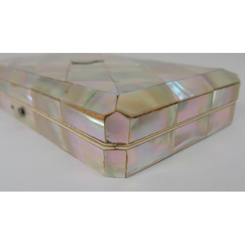 620 - A MOTHER OF PEARL SEWING KITwith mother of pearl accessories, 15cm, and another velvet sewing case w... 