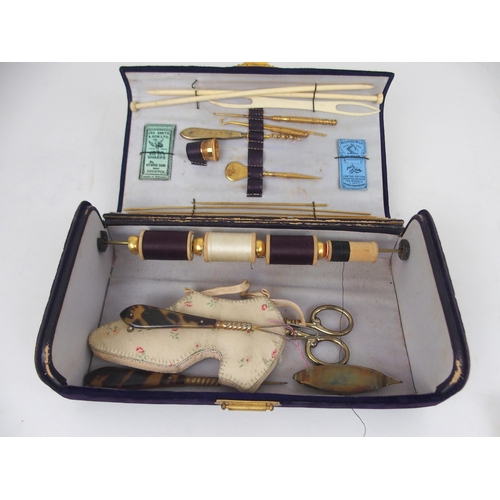 620 - A MOTHER OF PEARL SEWING KITwith mother of pearl accessories, 15cm, and another velvet sewing case w... 