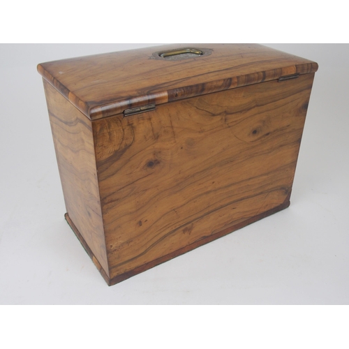 623 - A SATINWOOD STATIONERY CABINETwith hinged top and fall flap writing slope, fitted interior with sing... 