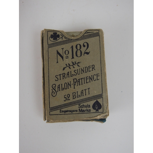 626 - A VICTORIAN GAMES COMPENDIUMwith hinged lid and twin flap doors, with associated chess pieces, draug... 