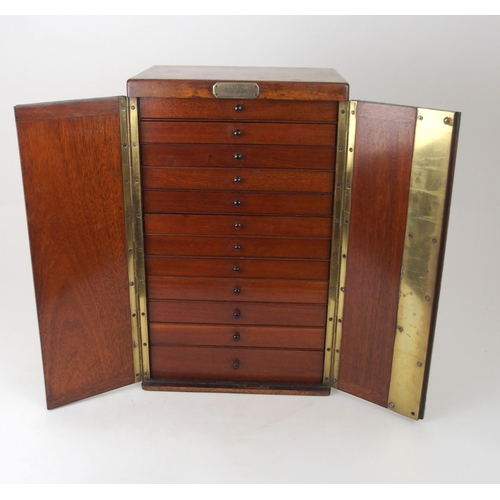 627 - A VICTORIAN MAHOGANY TWELVE-DRAWER COLLECTORS CABINETwith hinged front doors, with white-metal plaqu... 