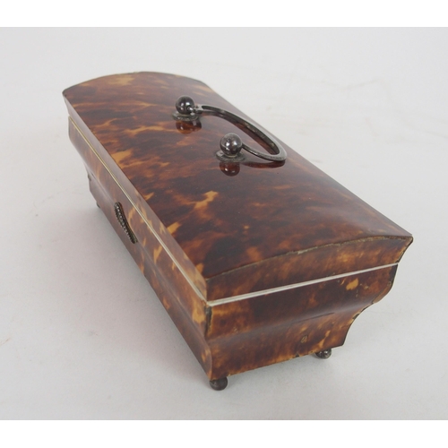 634 - A 19TH CENTURY TORTOISHELL SEWING CASKETwith hinged lid and swing handle, with original accessories ... 