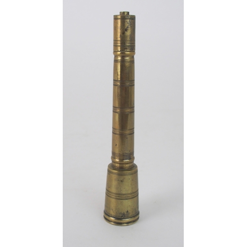 641 - A BRASS PENNERwith tapering inkwell and accessories, 14cm high