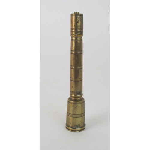 641 - A BRASS PENNERwith tapering inkwell and accessories, 14cm high