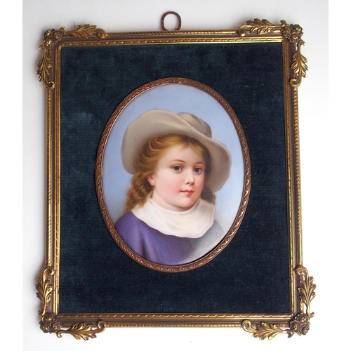 645 - A CONTINENTAL PORCELAIN PORTRAIT PLAQUEdepicting a child wearing a hat in gilt-metal frame, 12.5 x 1... 