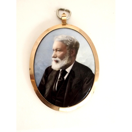 647 - A PAINTED PORTRAIT OVAL MINIATURE OF A GENTLEMANwearing a suit, in a 9ct gold frame, 8 x 6cm... 