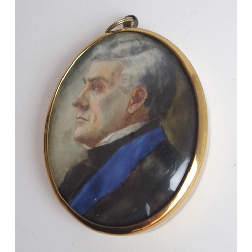 649 - WITHDRAWN LOTA PAINTED OVAL PORTRAIT MINIATURE OF A GENTLEMANin blue coat, 7.5 x 5cm in yellow-metal... 